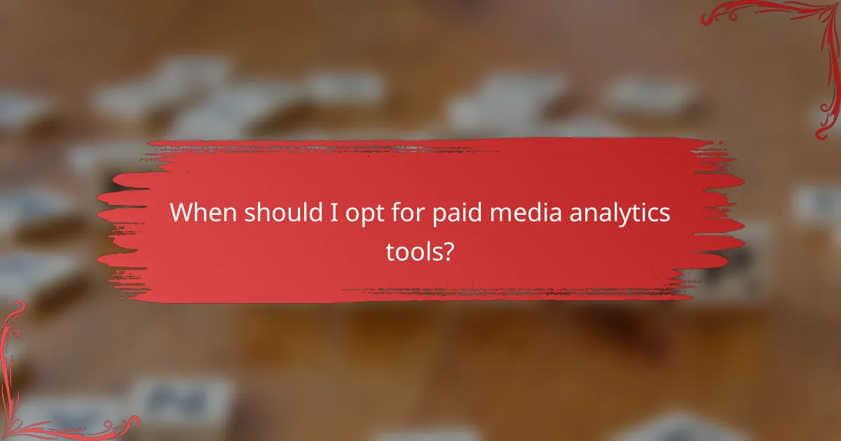 When should I opt for paid media analytics tools?
